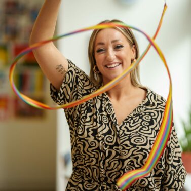 Look Ahead's Dance Movement Therapist Georgina twirling a ribbon used as part of her therapeutic dance activities.