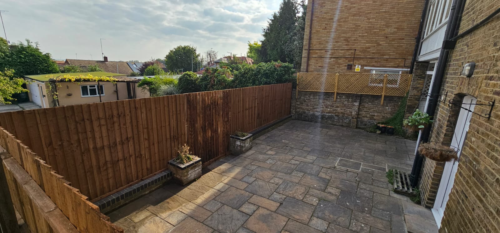 Private garden space for the service's ground floor flat resident.